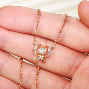 Collier pendentif nœud XL283 en argent 925 plaqué or avec cristaux et strass sertis griffe, chaîne maille forçat, unisexe, pour usage quotidien - Product Image 5