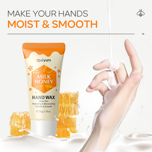 Cire pour les mains au miel et au lait QUIYUM 50g, hydratante et nourrissante, soin des mains en tube, crème mains au miel et au lait, soin quotidien de la peau, masque peel-off pour les mains - Product Image 1