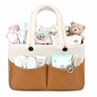 Organisateur de couches pour bébé en tissu Teddy et cuir, design color-block, grande capacité, portable, avec longue poignée souple