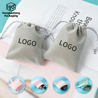 HKSLW Vente en gros de sacs à bijoux personnalisés avec logo, de haute qualité, doux, durables, sacs à bijoux de luxe avec cordon de serrage pour le rangement et l'emballage de cadeaux