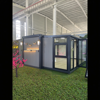 Appartement en conteneur préfabriqué de luxe moderne Villa portable modulaire alimentée par panneau solaire vie urbaine pour immeuble de bureaux acier