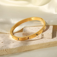 Vente en gros de bracelets design en acier inoxydable avec œil en zircone colorée en plaqué or pour cadeau