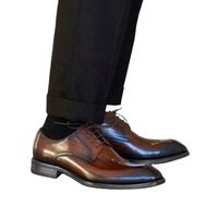 Chaussures en cuir populaires Yi Nuo 2026 pour hommes d'âge moyen en cuir véritable, tenue de ville
