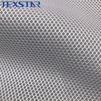 Tissu en maille hexagonale 3D respirant et écologique en polyester 100 % tricoté chaîne pour chaises, sacs et vêtements – Vente en gros