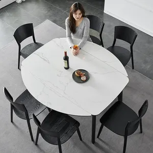 विस्तार योग्य गोल स्टोन डाइनिंग टेबल सेट 6 सीटर सिनर्ड स्टोन डाइनिंग टेबल सेट 6 कुर्सियाँ लक्जरी चीन फर्नीचर कंक्रीट