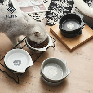 Nuovo Design produttore di articoli per <span class=keywords><strong>animali</strong></span> domestici ciotola per <span class=keywords><strong>animali</strong></span> domestici proteggere la colonna vertebrale simpatico impronta di gatto in ceramica cibo per gatti doppia ciotola prodotti per <span class=keywords><strong>negozio</strong></span> di <span class=keywords><strong>animali</strong></span> - Product Image 2
