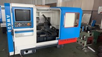 Machine de réparation et de rénovation de jantes CNC AWR26, nouveau design, tour à lit plat horizontal avec doubles broches et composants de roulement à billes