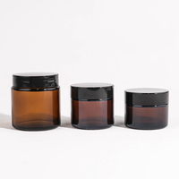 Bocaux en verre en gros avec bouchon à vis 50ml 60ml 100ml, capuchon noir, surface givrée, impression soyeuse pour crème de soin et blush