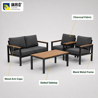 Ensemble de conversation pour patio 4 pièces, canapé et chaises en métal noir, table basse à lattes