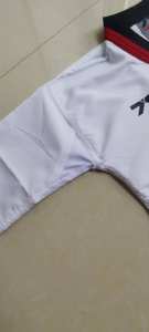 Haute qualité enfants étudiants <span class=keywords><strong>Combat</strong></span> uniforme respirant coton tissu Taekwondo formation vêtements fabricant <span class=keywords><strong>chinois</strong></span> en gros - Product Image 3