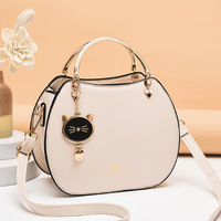 Nouveau Sac à Bandoulière Portable en Cuir PU pour Femme 2026 avec Fermeture Éclair, Petit Sac de Luxe avec Pendentif Chat, Sac Bandoulière