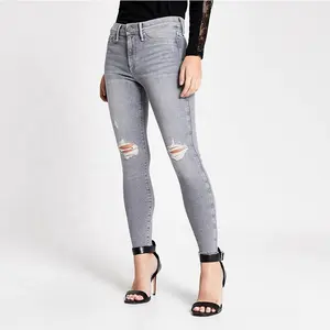 Оптовая продажа, женские серые укороченные рваные Джеггинсы со средней посадкой на заказ, женские узкие Стрейчевые джинсы из хлопка