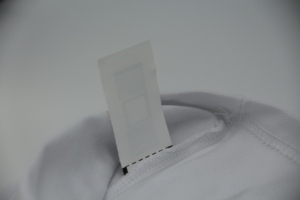 Impermeabile lavabile passivo <span class=keywords><strong>rfid</strong></span> abbigliamento <span class=keywords><strong>tag</strong></span> UHF <span class=keywords><strong>RFID</strong></span> etichetta per la cura dell'abbigliamento per la gestione della lavanderia per il monitoraggio dell'abbigliamento - Product Image 4