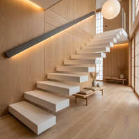 Escalier Flottant Blanc Moderne Minimaliste Invisible à Cantilever avec Marches en Pierre et Rampe LED pour Constructeurs et Entrepreneurs