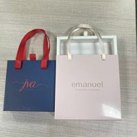 Mignonne boîte d'emballage de bijoux en papier avec logo personnalisé avec poignée coulissante motif rond pour boucle d'oreille collier bague ensemble pour offrir en cadeau