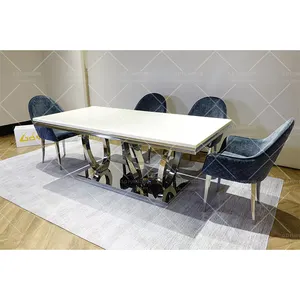 Table de salle à manger en marbre d'acier inoxydable de luxe élégant