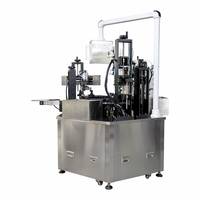Machine automatique 3-en-1 pour le lavage, le remplissage et le sertissage de flacons de parfum en verre pour l'emballage de parfums