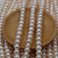 Perle d'eau douce naturelle presque ronde de haute qualité de 7 à 8mm avec un trou de grande taille de 2mm