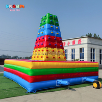 Château gonflable commercial en PVC pour parc d'attractions, avec toboggan, mur d'escalade et trampoline