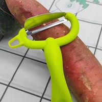 Gadgets de cuisine créatifs Rabot à melon en acier inoxydable irrégulier multifonctionnel Éplucheur à domicile pour éplucher les fruits