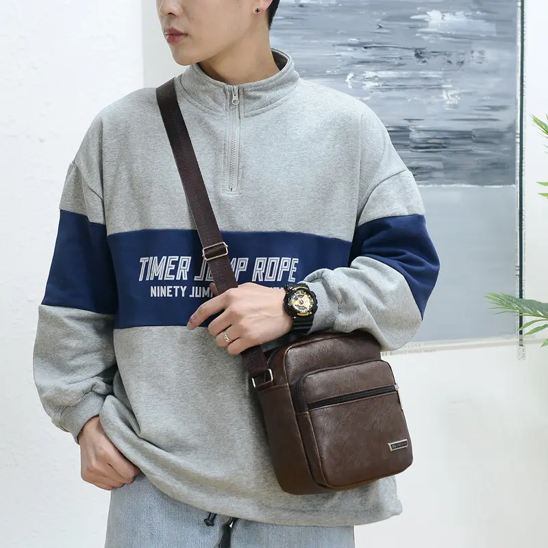 Bolso de hombre de piel sintética versión coreana nuevo bolso de hombro de negocios informal de gran capacidad bandolera