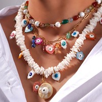 Collier de style bohème avec perles de coquillage en pierre naturelle et pendentif à pompon Chaînes classiques Design à la mode