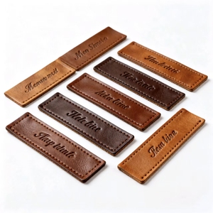 Großhandel Custom Name Logo Echtes Leder Label für Kleidung und Stiefel mit Roll Shape Patches - Product Image 1