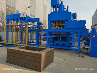 Machine de fabrication de briques en terre cuite emboîtables avec moteur, pression hydraulique, PLC automatique, composants essentiels du moteur, haute efficacité