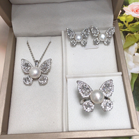 SHDIYAYUN Vente chaude Ensemble de bijoux de luxe en zircon, papillon féerique, perle d'eau douce naturelle, boucles d'oreilles, collier, bagues