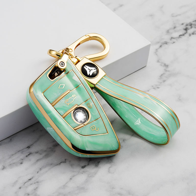 Cache bouton 4 boutons vert + porte-clés en TPU