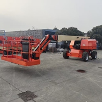 Plateforme élévatrice télescopique JLG 660SJ d'occasion 20m avec pièces de rechange, support export
