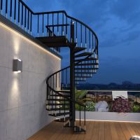 Escalier en colimaçon extérieur en acier au carbone, moderne, pour aménagement urbain, avec manchons d'axe dorés, haute performance et approvisionnement fiable, pour hall métallique