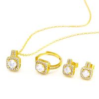 Vente en gros : Nouveauté de la mode, ensemble de bijoux de luxe en alliage plaqué or 18 carats, design de créateur, incrusté de zircon, collier, boucles d'oreilles et bague, unisexe