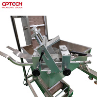 Machine de capsulage de machine d'alimentation automatique avec élévateur et chargeur de conteneur