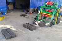 Machine de fabrication de blocs creux en béton QTF40-3B mobile manuelle à petite échelle, faible investissement, haute rentabilité, pour le bâtiment - Chine