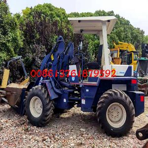 รถตักล้อยางโคมัตสึ WR8 มือสอง ขนาด 0.8 เมตร รับน้ำหนักได้ 1 ตัน พร้อมเครื่องยนต์ 4D95L กำลัง 41.2 กิโลวัตต์ - Product Image 5