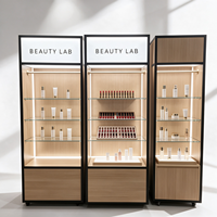 Étagère de présentation cosmétique modulaire en bois noir MDF et fer avec logo personnalisé CE ETL, présentoir de maquillage mobile avec boîte lumineuse