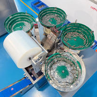Machine automatique de comptage et d'emballage de pièces détachées avec quatre bacs vibrants pour vis, écrous, boulons et kits de fixation