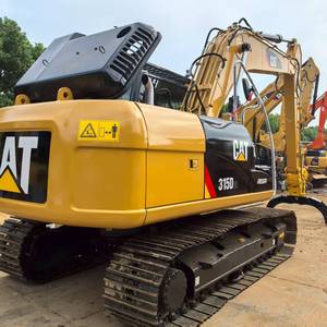 Excavatrice de chantier Caterpillar 315D2L haute performance, 15 tonnes, chenilles longues, modèle CAT315D2L avec grappin à bois. - Product Image 1