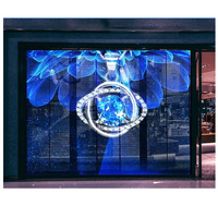 Écran LED transparent Unilumin pour intérieur/extérieur, affichage en verre haute transparence, publicité en vitrine, éclairage de centre commercial, décoration