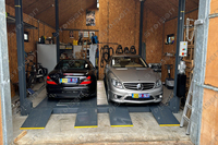 Système de stockage automatisé pour parking : élévateur de stationnement à quatre poteaux pour 4 véhicules avec barrière