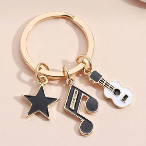 Nuevo y Popular Llavero Colgante para Bolso con Diseño de Notas Musicales, Fonógrafo, Teclado, Auriculares, Micrófono, Piano, Violín y Banda - Product Image 2
