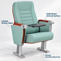 Chaise d'auditorium avec tablette d'écriture pliable, panneau arrière en bois perforé, siège de théâtre rembourré en tissu