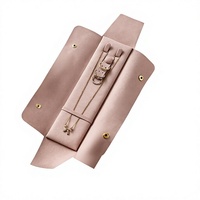 Pochette à bijoux portable en microfibre, rouleau à bijoux en velours avec bouton-pression, sac de rangement pour colliers, boucles d'oreilles et bagues, idéal pour les voyages