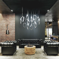 Fabricants de lustres suspendus en verre LED pour la décoration intérieure, spécialisés dans l'éclairage des villas, appartements, bars et escaliers