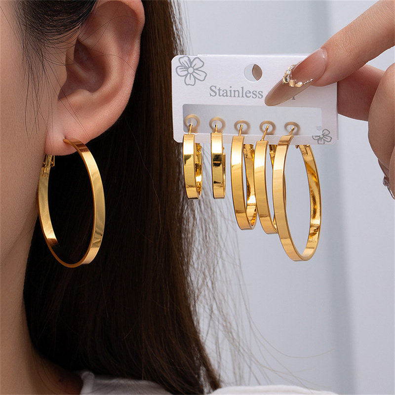 Exaggerated Large Spiral Cross Circular Ring