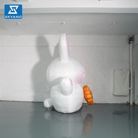 Lapin gonflable personnalisé de dessin animé avec la lune Sculpture de personnage de lapin de dessin animé gonflable pour la décoration d'art de vacances