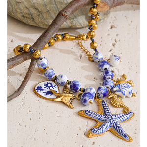 JINYOU 7438 <span class=keywords><strong>Collana</strong></span> Girocollo in Acciaio Inossidabile Placcato Oro a Tema Oceano con Perline in Ceramica Blu e Bianche e Ciondolo a <span class=keywords><strong>Stella</strong></span> <span class=keywords><strong>Marina</strong></span> Smaltata - Product Image 4