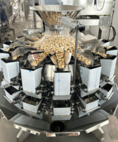 Petite machine automatisée de pesage et d'emballage quantitatifs d'aliments pour granules/poudre/riz/noix/thé Peseuse à têtes multiples Machine de remplissage