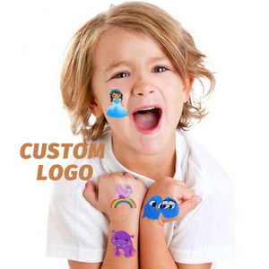 Рождественская наклейка на лицо и тело с героями мультфильмов OEM, набор блестящих временных татуировок для детей - Product Image 1